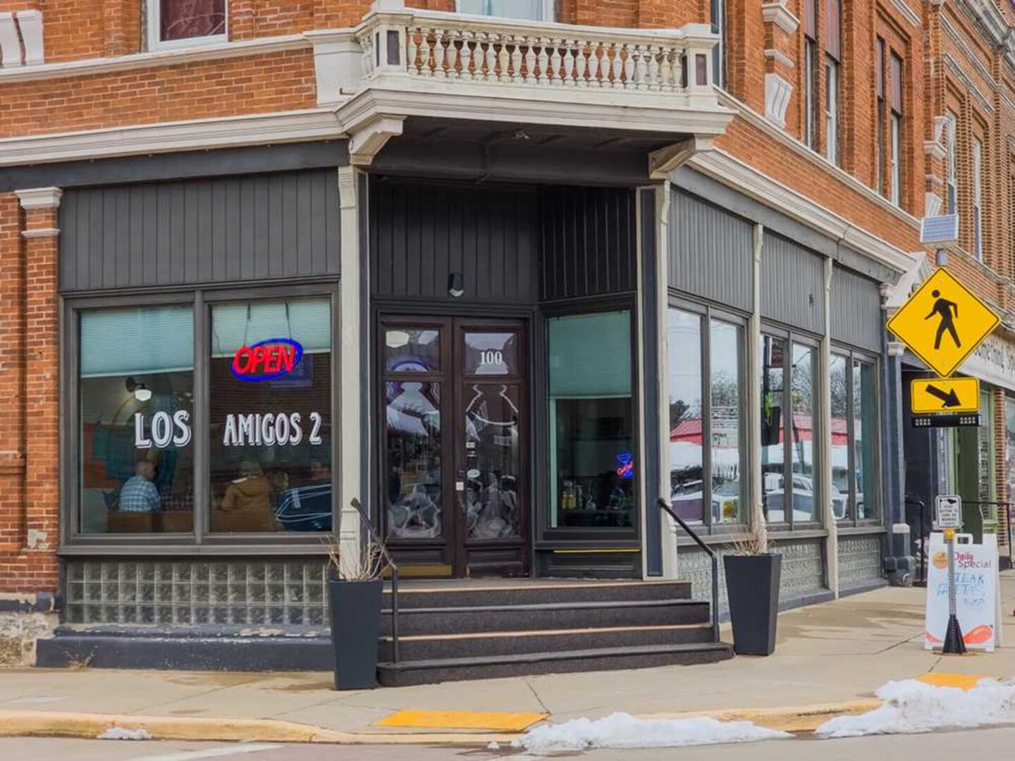 A building with two doors and a lot of windows